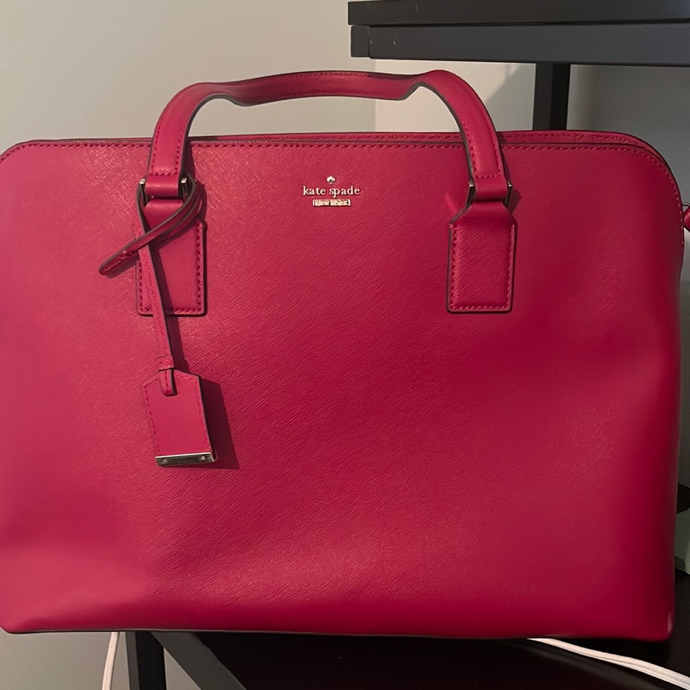 Kate Spade Satchel with a place to carry a small laptop or ipad.